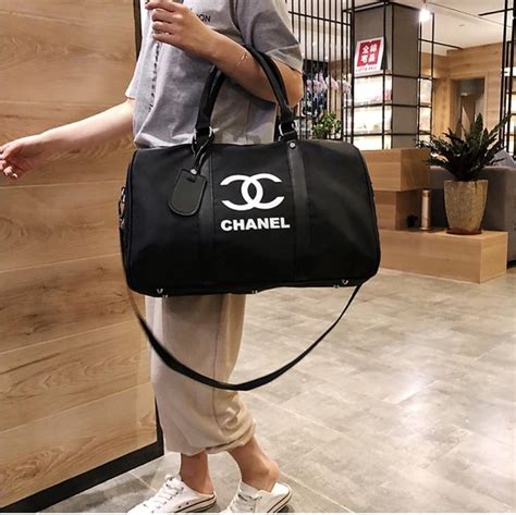 pink chanel duffle bag|chanel travel bag with wheels.